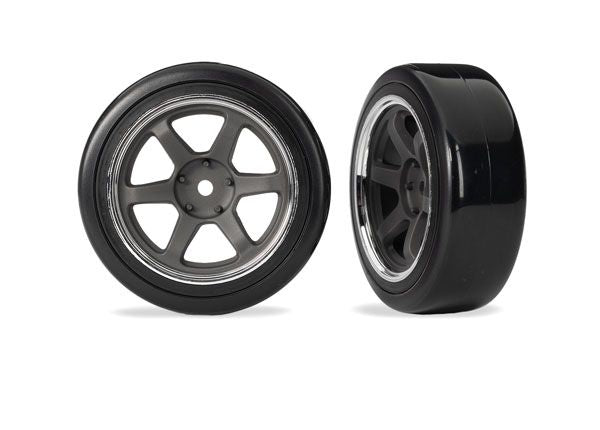 Traxxas Tires & wheels, assembled, glued (six spoke graphite gray wheels w/chrome rim, 1.9" Drift tires (1 dot, hard, rough surfaces)) (front) (2)