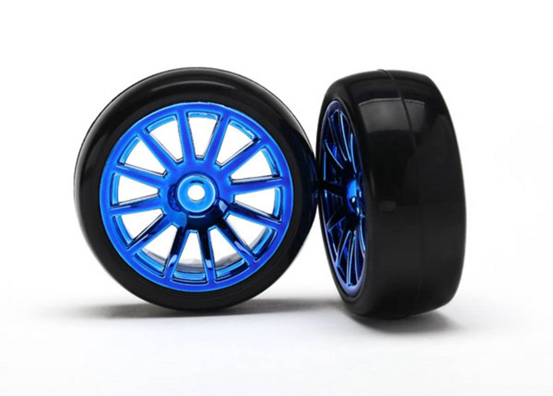 Traxxas Tires & wheels, assembled, glued (12-spoke blue chrome wheels, slick tires) (2)