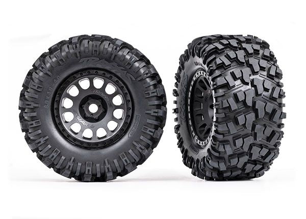 Traxxas Tires & Wheels, Assembled, Glued (XRT Race Black Wheels, Maxx At Tires, Foam Inserts) (Left & Right)