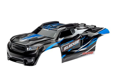 Traxxas Body, Sledge, blue/ window, grille, lights decal sheet (assembled with front & rear body mounts and rear body support for clipless mounting)